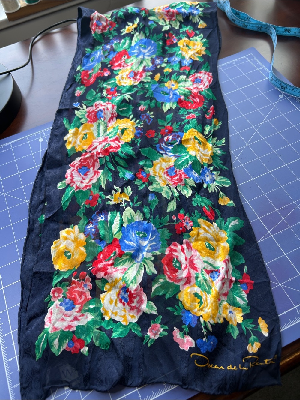 Oscar De La Renta floral scarf multi color euc rolled edges navy background